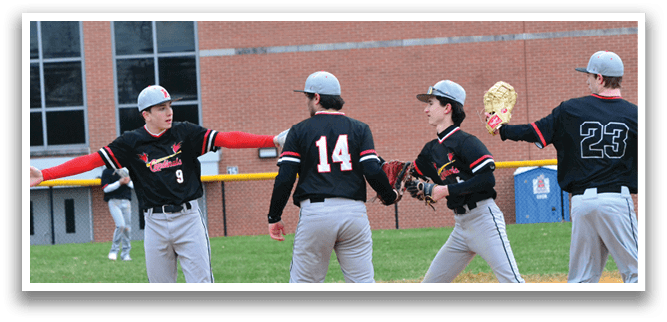 A group of baseball players on a field. Description generated by AI