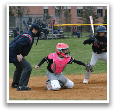 A baseball player slides into home plate. Description generated by AI