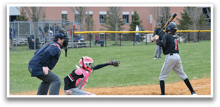 A baseball game is taking place with a batter, catcher, and umpire. Description generated by AI