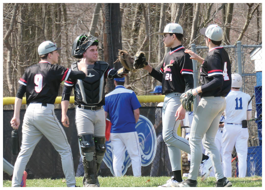 Baseball players on a field. Description generated by AI