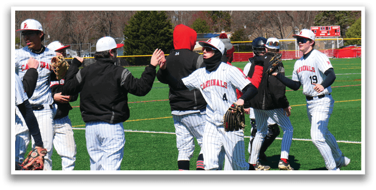 Baseball players celebrating on the field. Description generated by AI