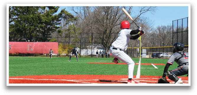 A baseball game is taking place on a field. Description generated by AI