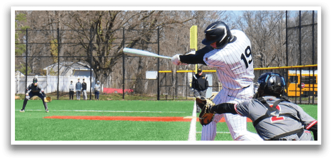 A baseball player in a white and red uniform is swinging a bat. Description generated by AI