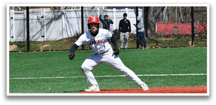 A baseball player is at home plate, ready to hit the ball. Description generated by AI