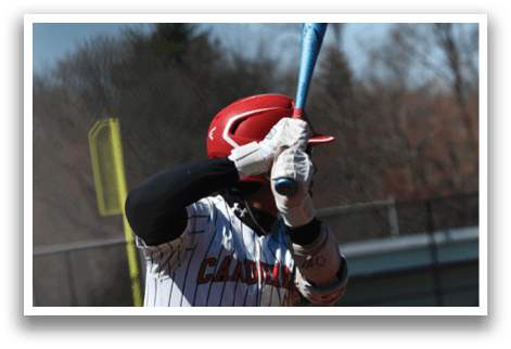 A baseball game is taking place with a batter, catcher, and umpire. Description generated by AI
