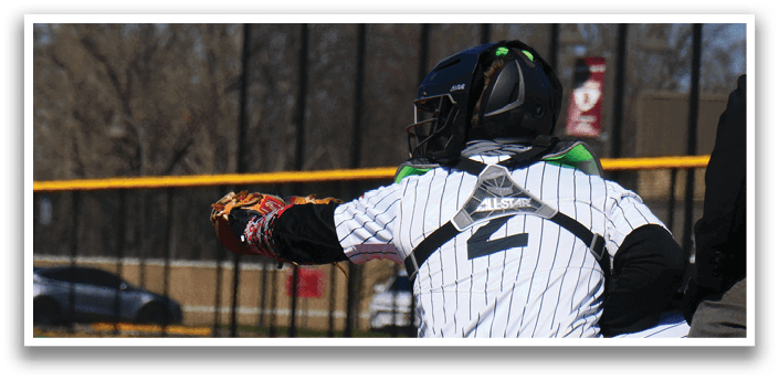 A baseball player wearing a helmet and catcher's mitt. Description generated by AI