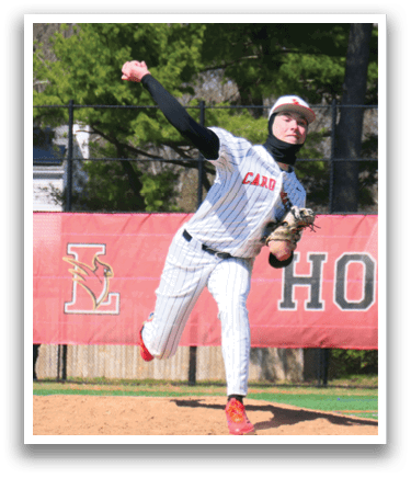 A baseball player in a red and white uniform is pitching a ball. Description generated by AI