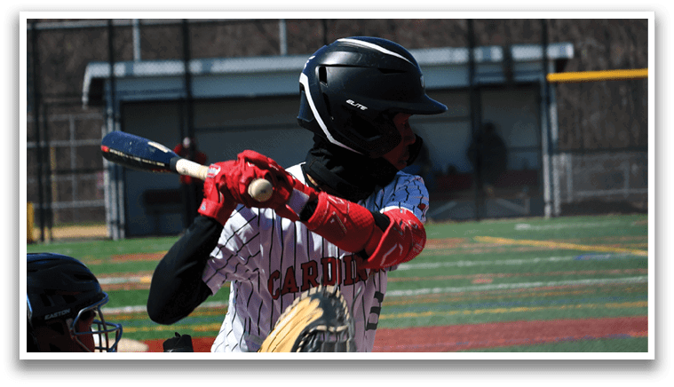 A group of men wearing black and white uniforms hugging each other. Description generated by AI