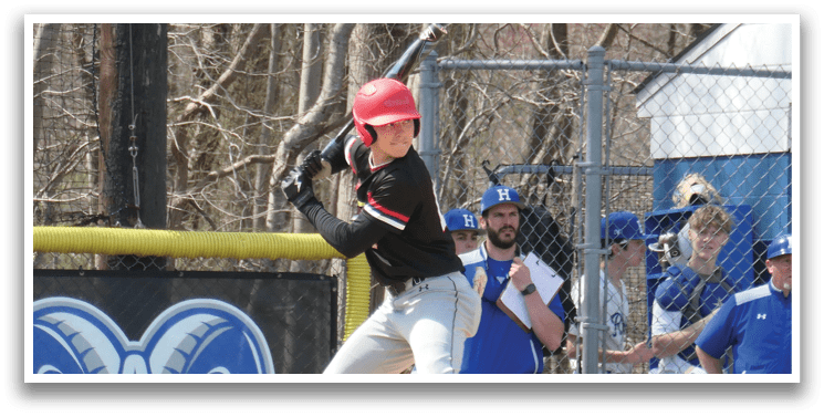 A baseball player is swinging a bat. Description generated by AI