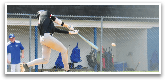 A baseball player is swinging a bat at a ball. Description generated by AI