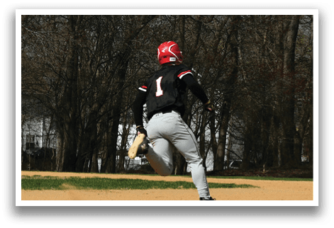 A baseball player running to first base. Description generated by AI