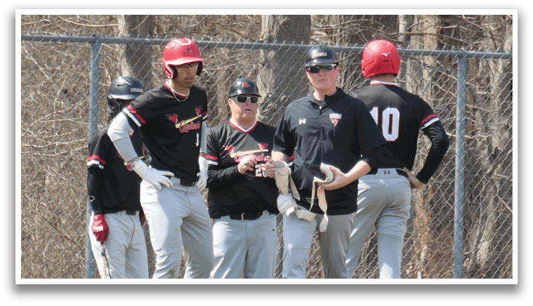 Baseball players in uniforms on a field. Description generated by AI