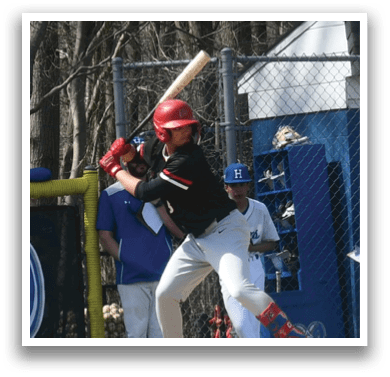 A baseball player is swinging a bat. Description generated by AI
