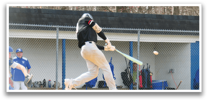 A baseball player is swinging a bat at a ball. Description generated by AI