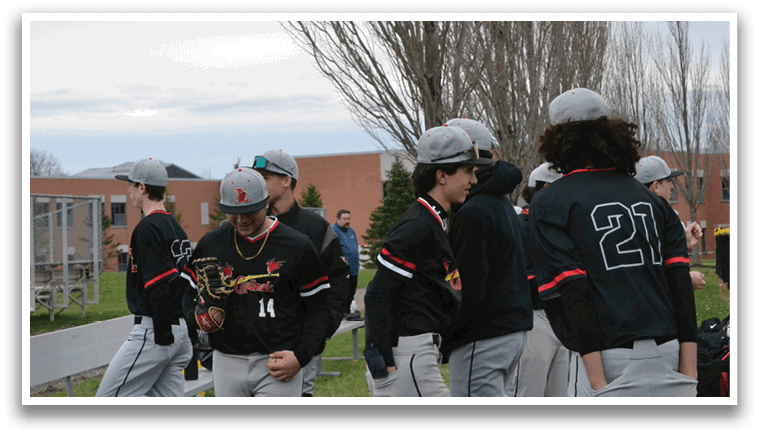A group of young men wearing baseball caps and jerseys. Description generated by AI