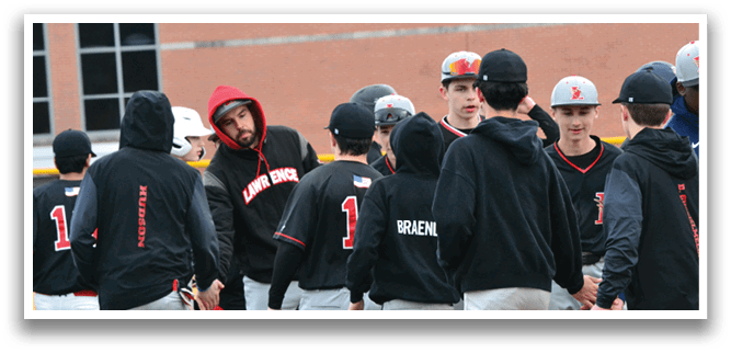 A group of baseball players wearing black and red jackets. Description generated by AI