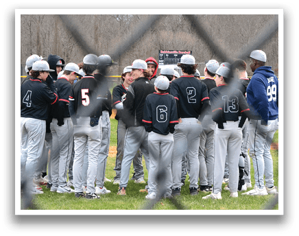 Baseball players on a field. Description generated by AI
