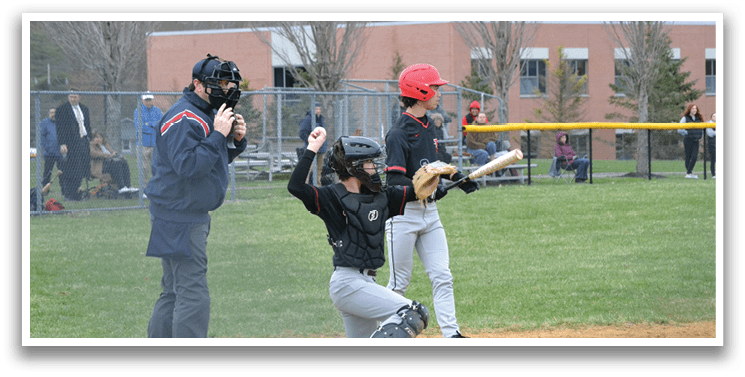A baseball game is taking place with a batter, catcher, and umpire. Description generated by AI
