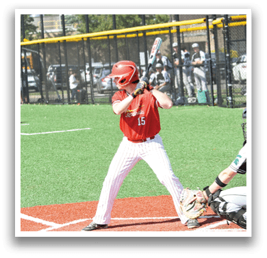 A baseball player in a red shirt and white pants is swinging a bat. Description generated by AI