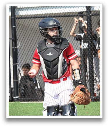 A baseball player wearing a helmet and catcher's mitt. Description generated by AI