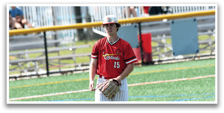 A baseball player wearing a red shirt and white pants with the number 15 on the back. Description generated by AI