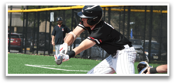 A baseball player in a black and white uniform is swinging a bat. Description generated by AI