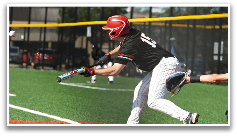 A baseball player is swinging a bat at a ball. Description generated by AI