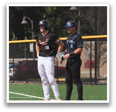 A baseball player wearing a black helmet and white pants. Description generated by AI
