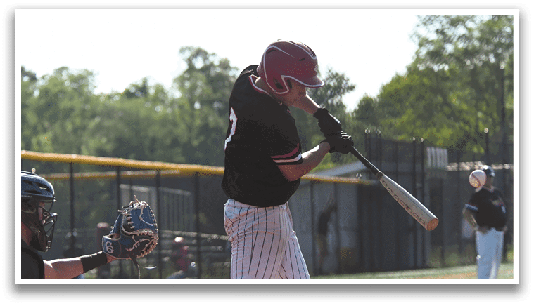A baseball player is swinging a bat. Description generated by AI
