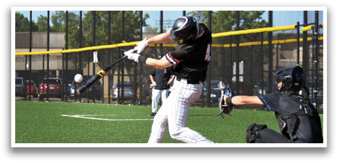 A baseball player is swinging a bat at a ball. Description generated by AI