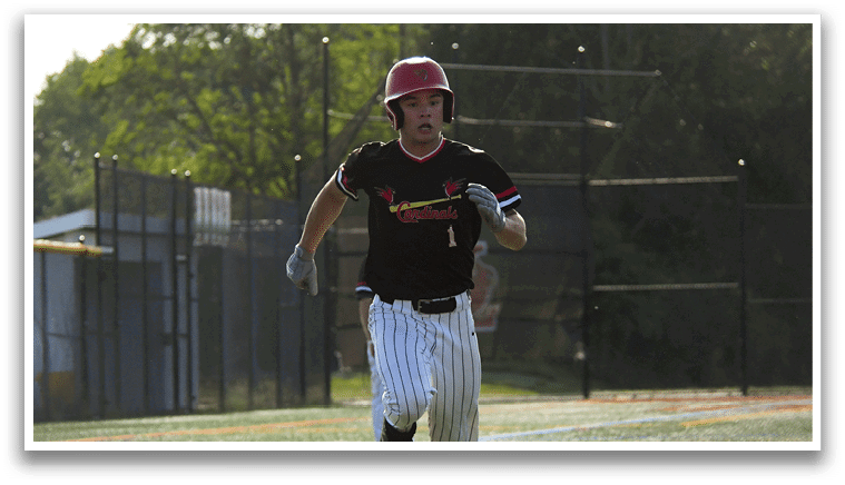 A baseball player running on the field. Description generated by AI