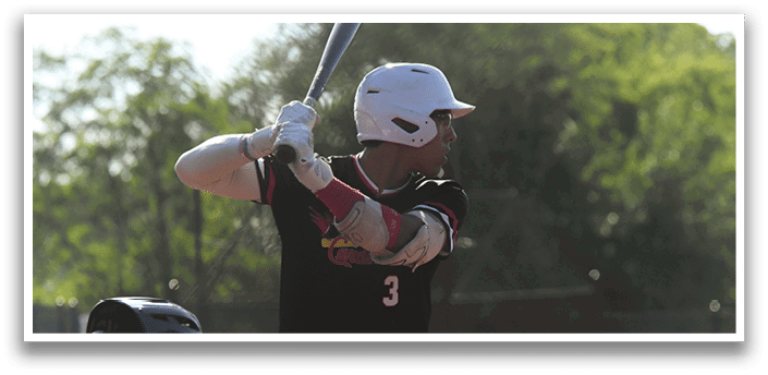 A baseball player is holding a bat and getting ready to hit the ball. Description generated by AI