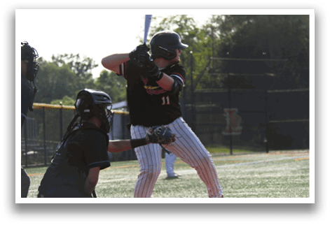 A baseball player is swinging a bat. Description generated by AI