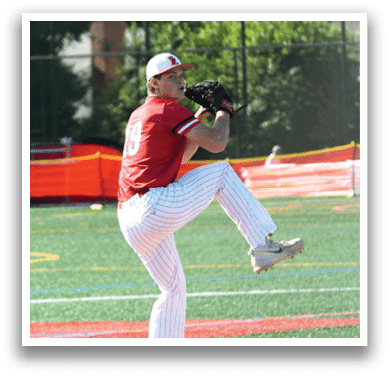 A baseball player wearing a red shirt and black helmet. Description generated by AI