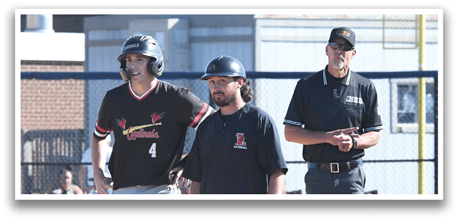 A group of baseball players wearing red shirts and white pants. Description generated by AI