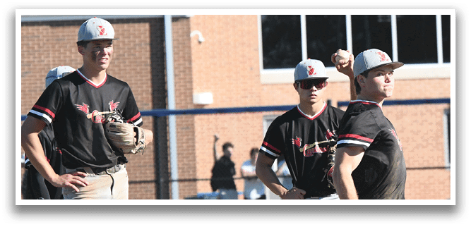 A group of baseball players wearing red shirts and white pants. Description generated by AI