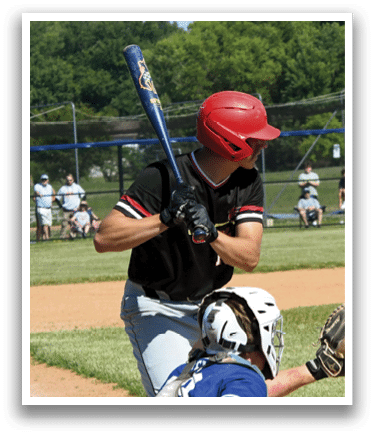 A baseball player wearing a helmet and catcher's mitt. Description generated by AI
