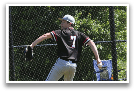 A baseball player is kneeling on the field. Description generated by AI