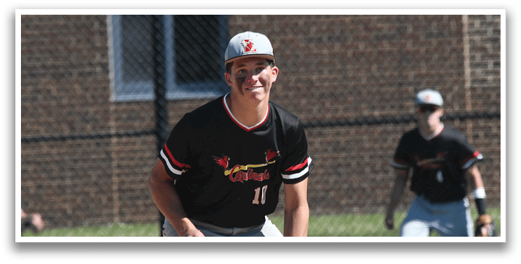 A baseball player wearing a red shirt and white pants with the number 15 on the back. Description generated by AI