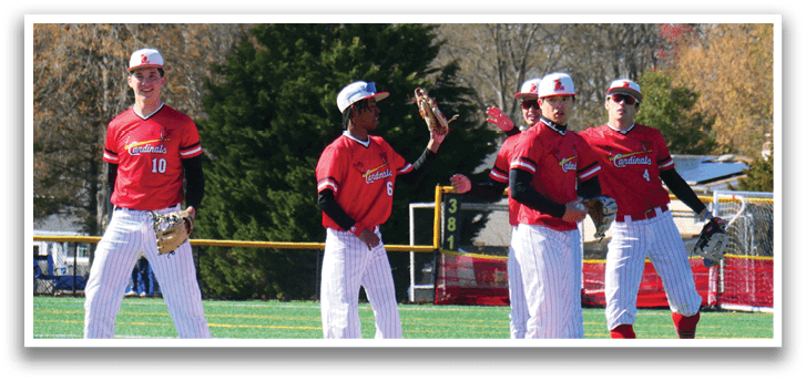A group of baseball players on a field. Description generated by AI