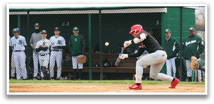 A baseball player is swinging a bat at a ball. Description generated by AI