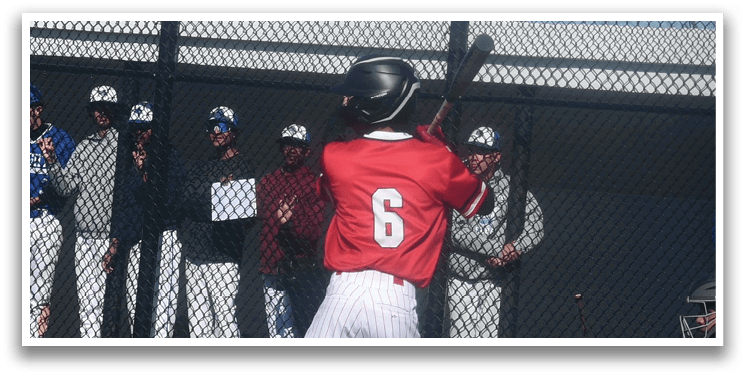 A baseball player is swinging a bat. Description generated by AI