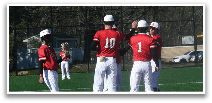 A group of baseball players on a field. Description generated by AI