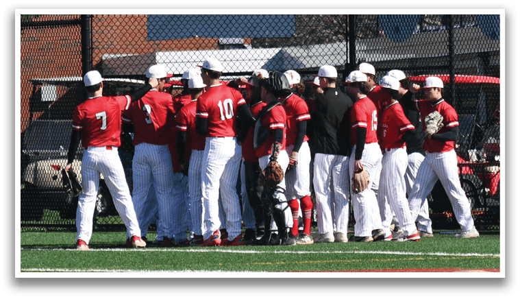 A group of baseball players sitting on a bench. Description generated by AI