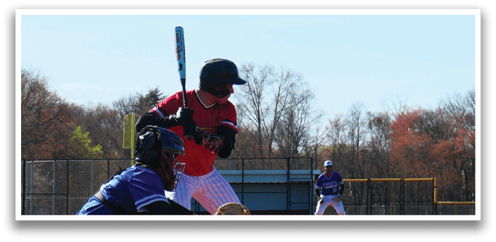 A baseball player is swinging a bat at a ball. Description generated by AI