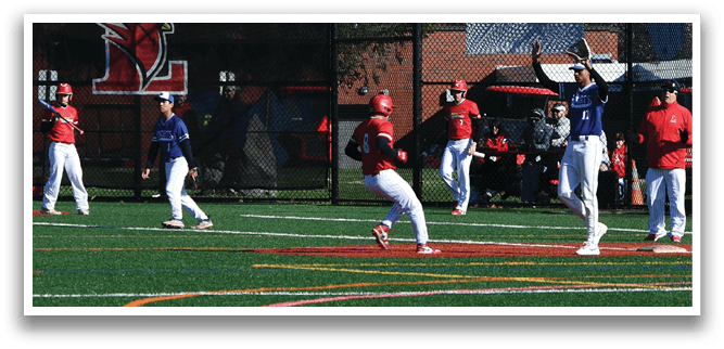 A baseball field with a group of people playing baseball. Description generated by AI