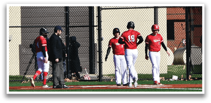A baseball game is taking place on a field with a group of people playing. Description generated by AI
