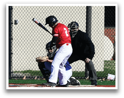 A baseball player is at bat, holding a bat and standing next to a catcher. Description generated by AI