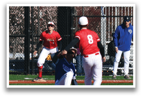 A baseball player is kneeling on the ground with his hands on his knees. Description generated by AI