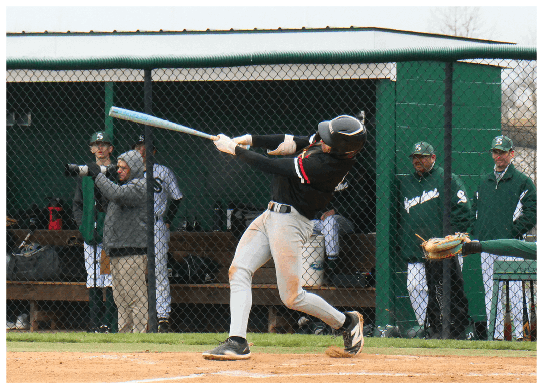A baseball player is swinging a bat. Description generated by AI